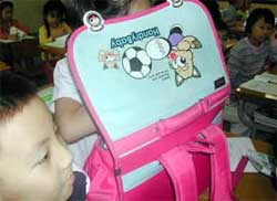 'Burden' when children wear backpacks