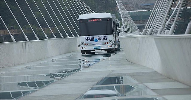 China: Drive a bus through a giant glass bridge to demonstrate the safety of the bridge