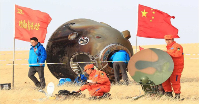 Chinese astronauts return to Earth after a month in space