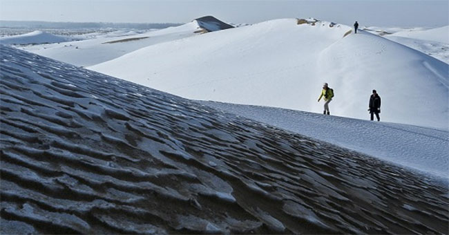 Chinese desert covered in white snow in the weather -25 degrees Celsius
