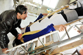 Chinese farmers make beds that cure their wife's kidney stones