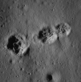 Close up of 3 mysterious holes on the Moon