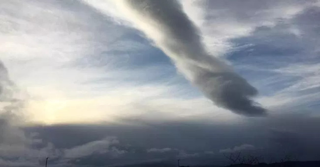 Cloud like hand reaching to the ground