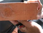 Compress mud into bricks