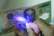 Detecting fake money