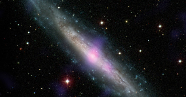 Discovered two giant black holes lurking in galaxies near us