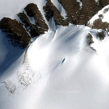 Discovering UFO bodies falling buried in the snow in Antarctica?