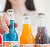 Drinking soft drinks long time can wear away enamel