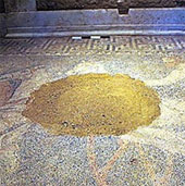 Excavation of mosaic paintings in Greek tombs