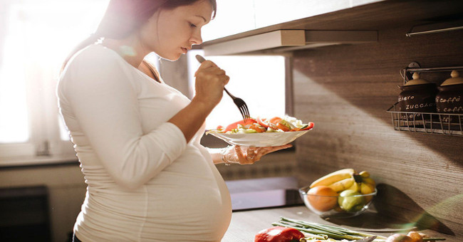 Explain the science behind the pregnant woman's curious appetite