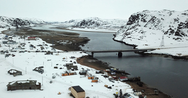 Explore the snow-covered village in the Arctic region