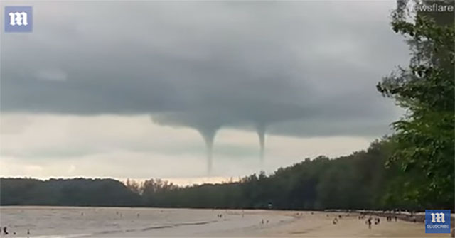 Extremely rare dual dragon hoses sweep the sky over Thailand