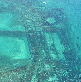 Find the ancient Roman statue at the underwater palace
