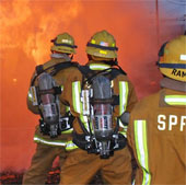 Fire hose looking through the smoke
