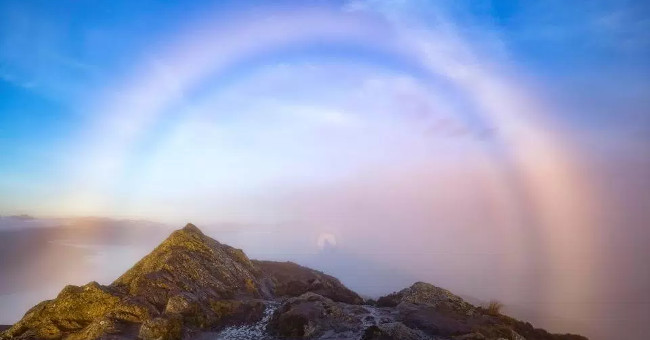 'Ghost' between a foggy rainbow in Scotland