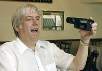 Hand-held machine helps blind people read printed newspapers