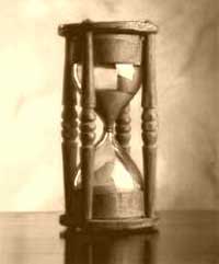 Hourglass and candles just hours.