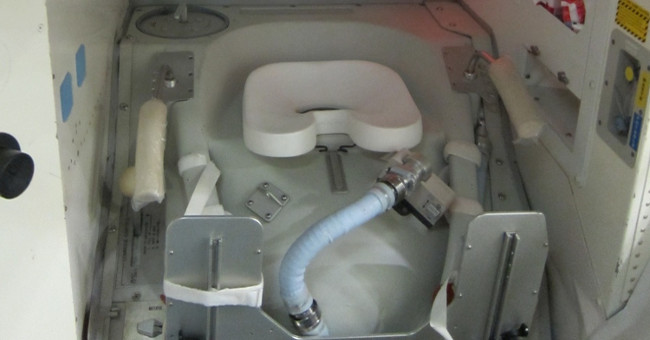 How do astronauts use the toilet in space?