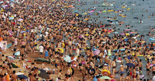 How many people does our Earth live with?