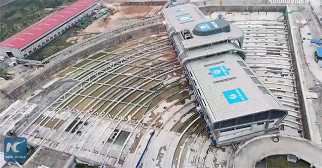 How the Chinese moved the 30,000-ton bus stop to make way for the new train line