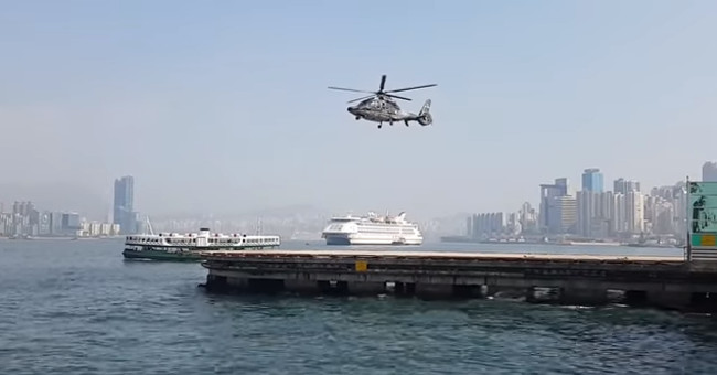 Illusion of flying helicopters with stationary propellers