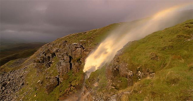 Interesting: The waterfall has water ... flowing up and down the sky