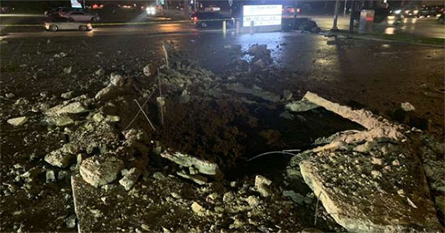 Lightning strikes form a 4.6m wide pit in the middle of the parking lot