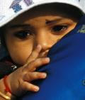 Look at the eyes of the child guessing the disease