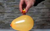 'Magic tricks' explodes balloons with orange peels