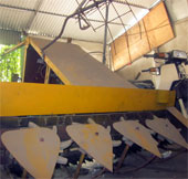 Mechanic fabricates rice harvesters from waste products