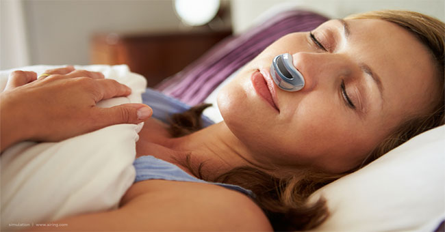 Mini breathing machine corrects snoring sleep