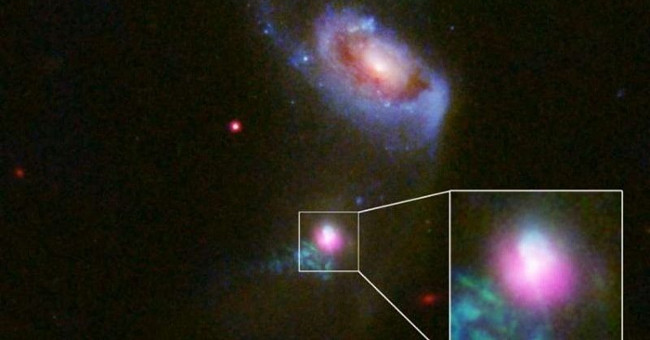 Monster black hole 'belching' twice after swallowing gas