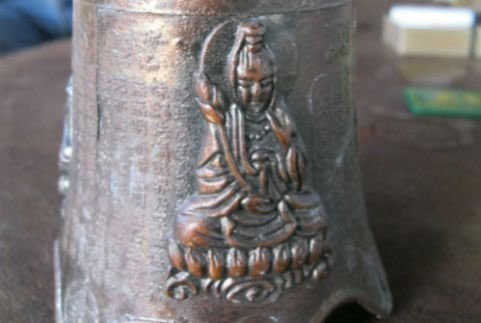 Mysterious ancient bell with Buddha image in Phu Yen