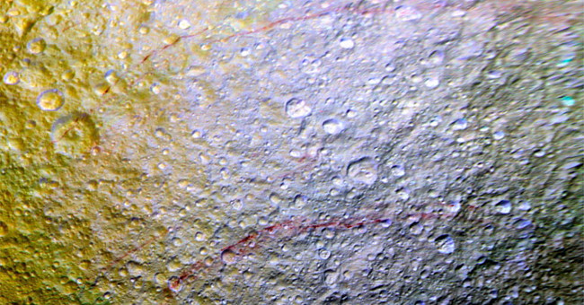 Mysterious red streaks on Saturn moon