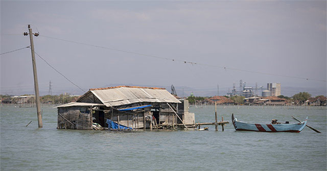 Mysteriously the village is sinking into the sea