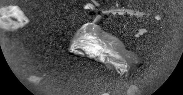 NASA robot investigates strange shiny stone blocks on Mars