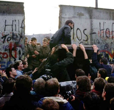November 9, 1989 - The Berlin Wall collapsed, Germany united