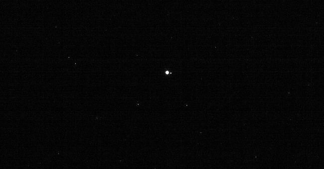 Photo of the Earth and the Moon from a distance of more than 60 million km