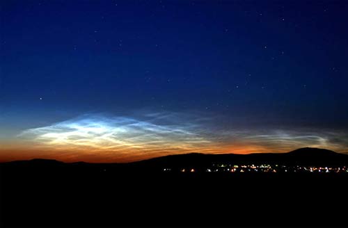 Polar regions appear mysterious glowing clouds