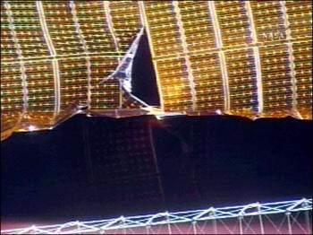 Postpone deploying a solar panel on the international space station