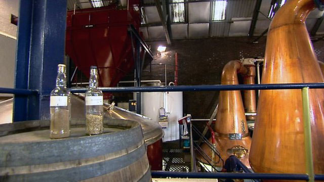 Producing car 'gasoline' from distillers