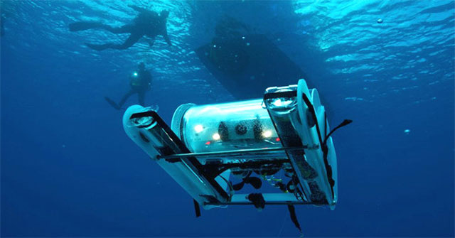 Scuba diving device with battery ... fish feces