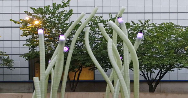 See machine builders 'weave' so the whole building is as big as glass fiber