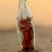Ship Coca Cola bottle made of ice