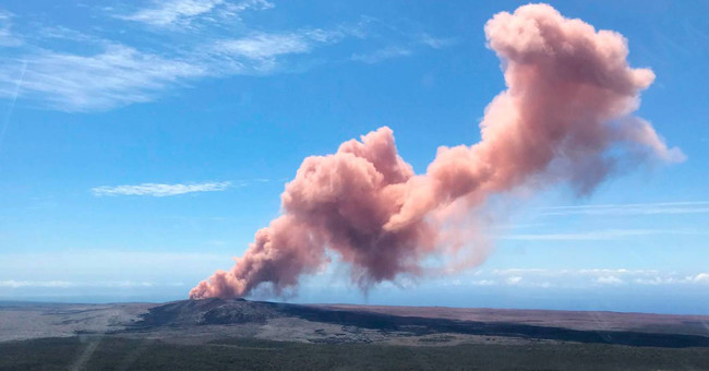 Smoke and bright red lava erupted from the Hawaii crater