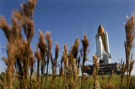 Space shuttle Atlantis into the launch pad