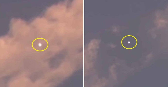 Spotlight UFO dissipates the surrounding cloud as it passes