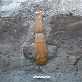 Stone age ax with wooden handle