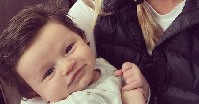 Strange new born baby girl has super beautiful short hair