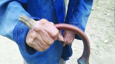 Strangely the old man grew horns in his hand